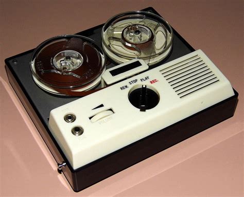 1978 An audio tape recorder , also known as a tape deck , tape player or tape machine or simply a tape recorder , is a sound recording and reproduction device that records and plays back sounds usually using magnetic tape for storage. . Reel to reel player 1960s